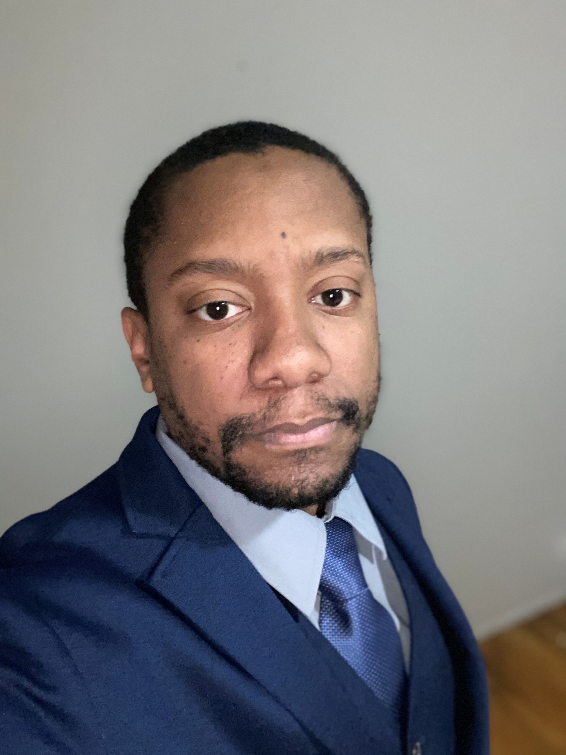 dominicbookerheadshot2025